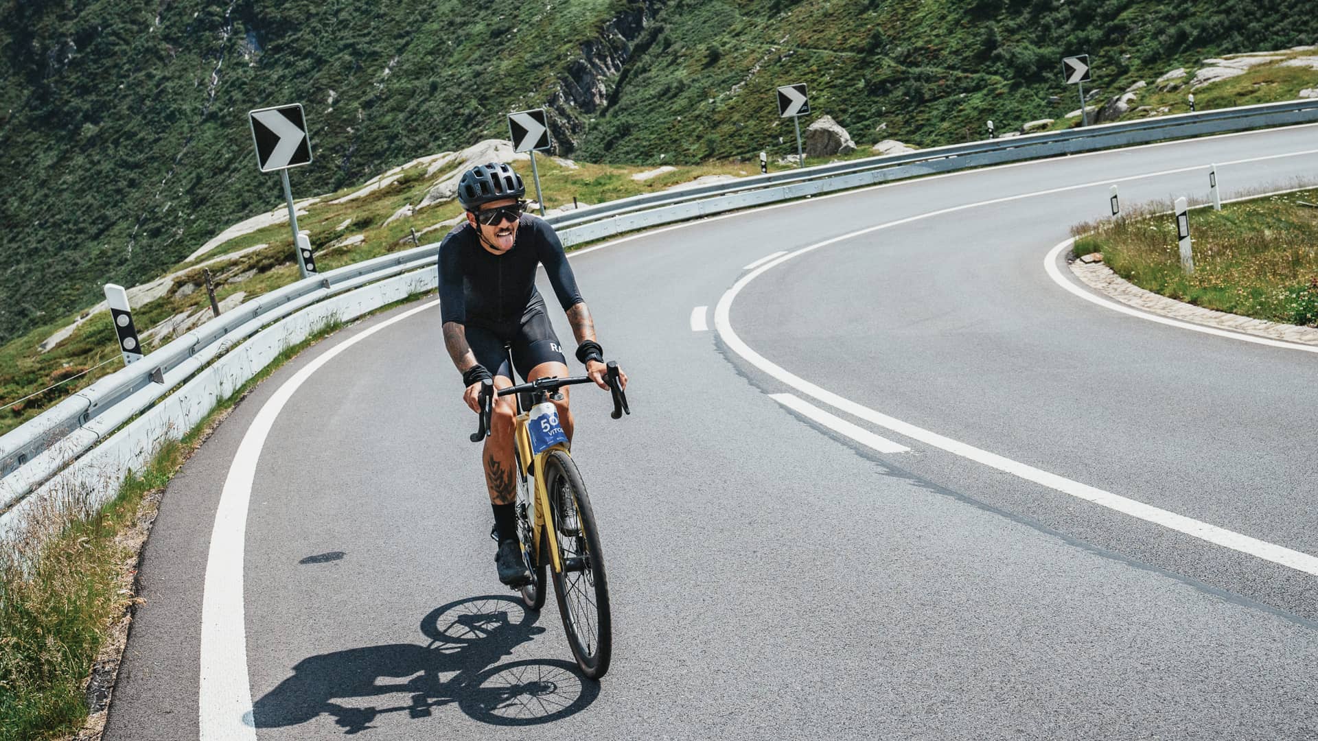 Cyclist Vitor climbing the northern ramp of Gotthard Pass
